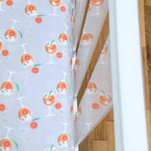 Load image into Gallery viewer, Amalfi Coast Aperol Spritz Gray Crib Sheet